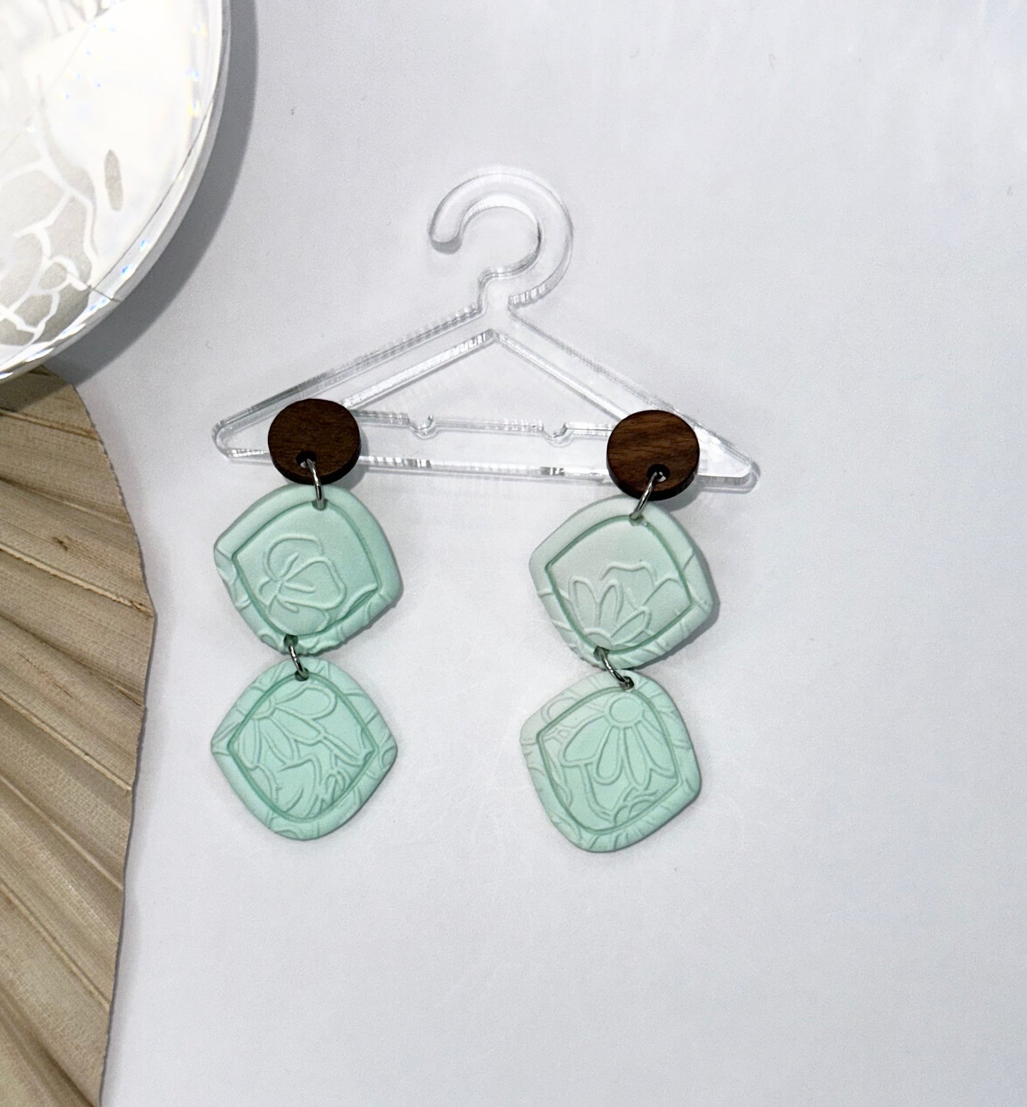 Light teal dangles